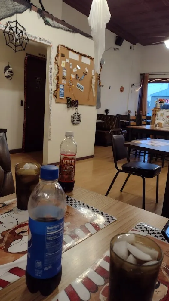 Having a Cold Drink and Enjoying the Spooky Halloween Decorations at the Connect Sub Shop