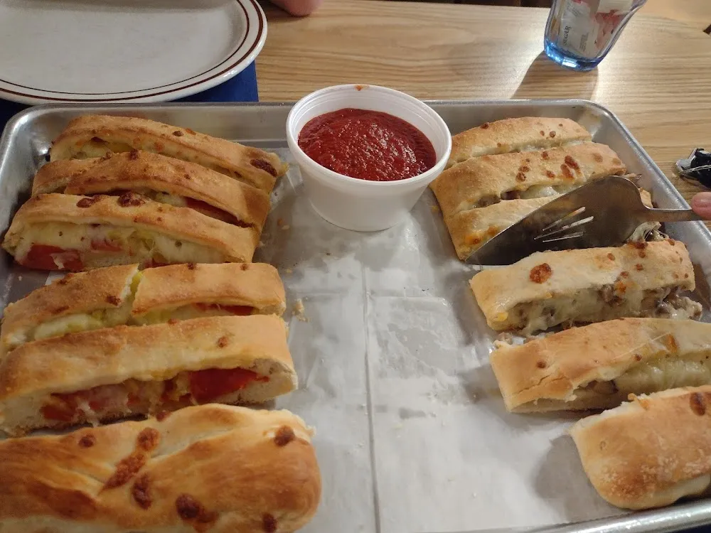 Stromboli Half Peppers Half Mushroom and Sausage